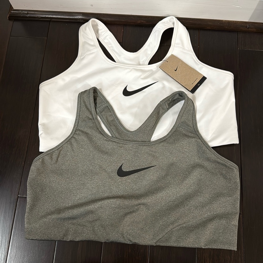 Nike 
Sports bra
never been worn 
One grey 
One white with tag 
$25 each